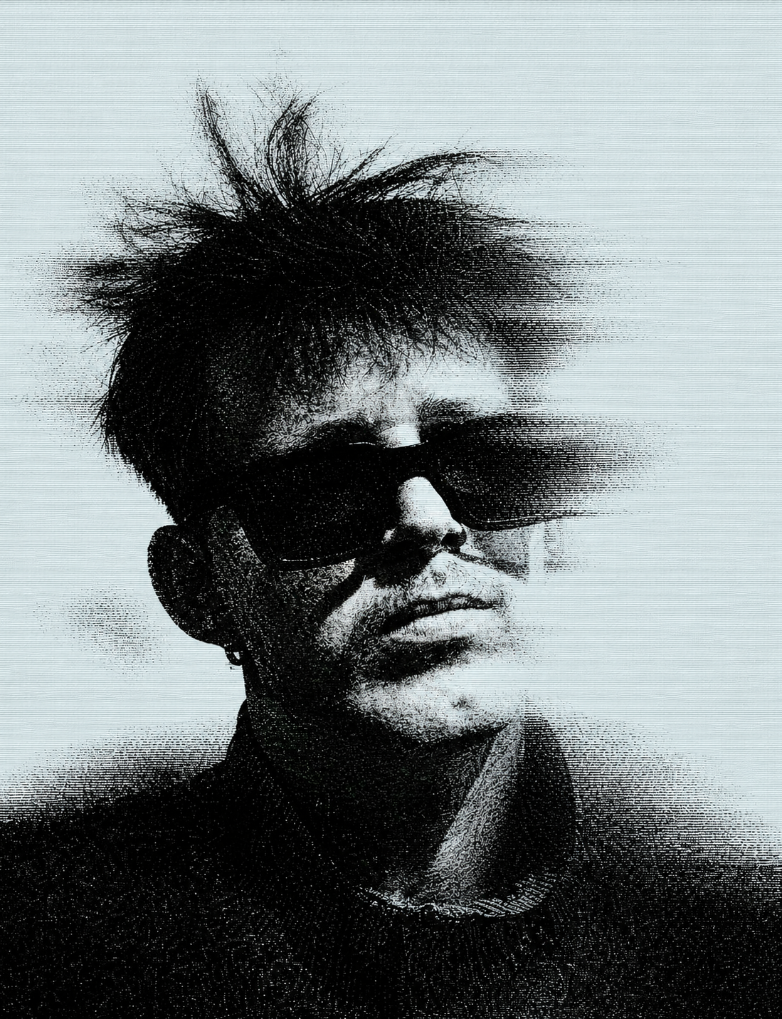 Black and white portrait of Lemmy wearing sunglasses
